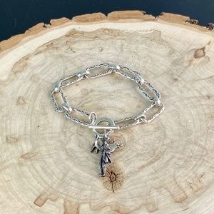 Antique Silver Bull and Matador bracelet